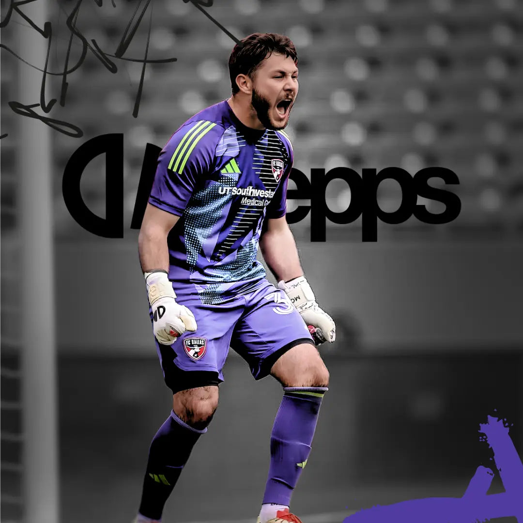 Soccer goalkeeper in a purple uniform with kiepps AeroLite PRO goalkeeper gloves