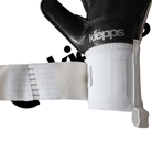 Close-up of a black and white Kiepps goalkeeper glove with a white wrist wrap, shown against a white background.