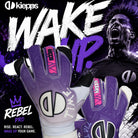 Kiepps Rebel Pro soccer gloves in purple, white, and black, displayed against a dynamic purple and black graphic background featuring a player and bold text.